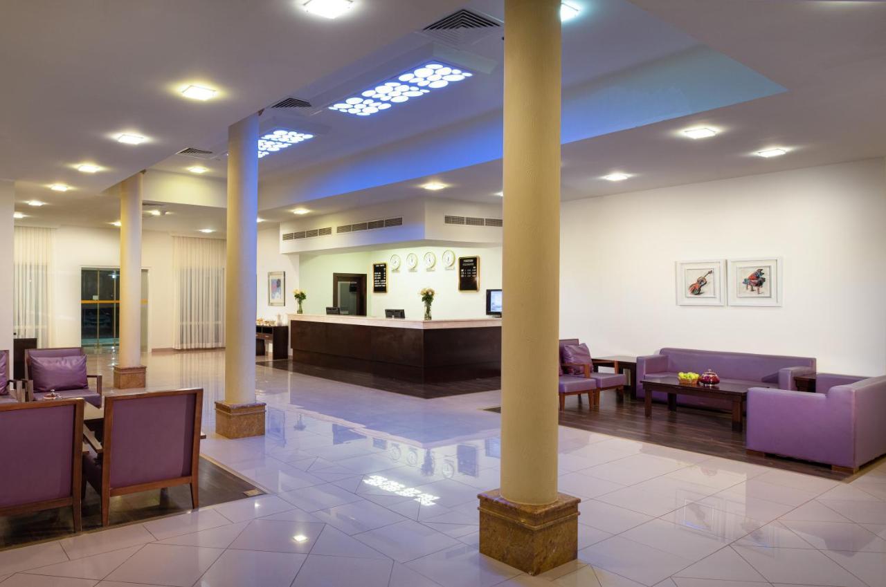 City Hotel Дукм Экстерьер фото