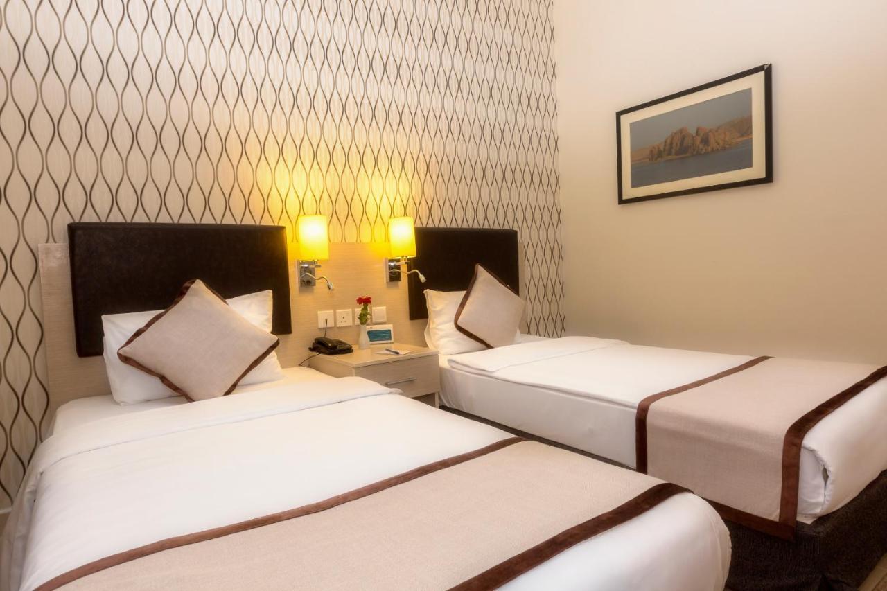 City Hotel Дукм Экстерьер фото