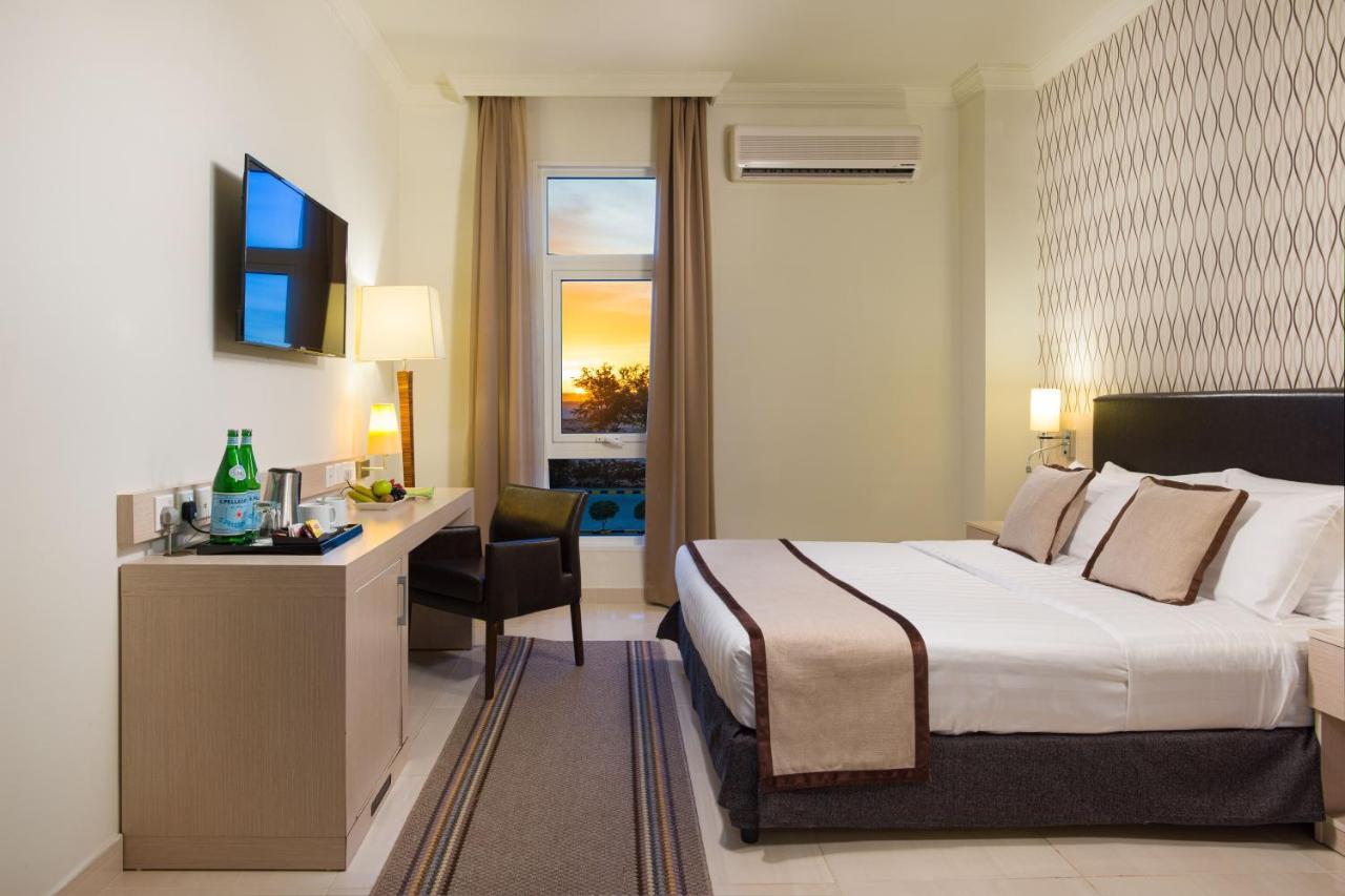 City Hotel Дукм Экстерьер фото
